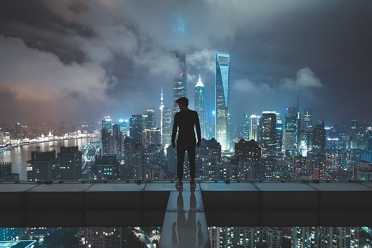 man standing on skyscraper wallpaper, man wearing black shirt staring at the city