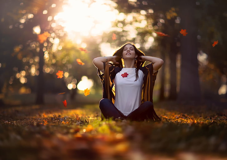 women's white crew-neck shirt, black haired woman in white top sitting surrounded by trees, HD wallpaper