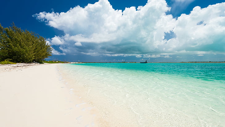 Nếu bạn đang tìm kiếm một không gian làm việc hoặc giải trí tuyệt đẹp để tăng cường sự năng động, hãy xem hình nền HD của Grace Bay, Providenciales, Turks và Caicos. Với dòng biển trong xanh và bãi cát trắng tinh khiết, bạn sẽ bị lôi cuốn và thấy như đang đứng trên bờ biển thật. 
