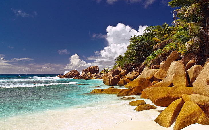 body of water and brown rocks, stones, boulders, coast, beach