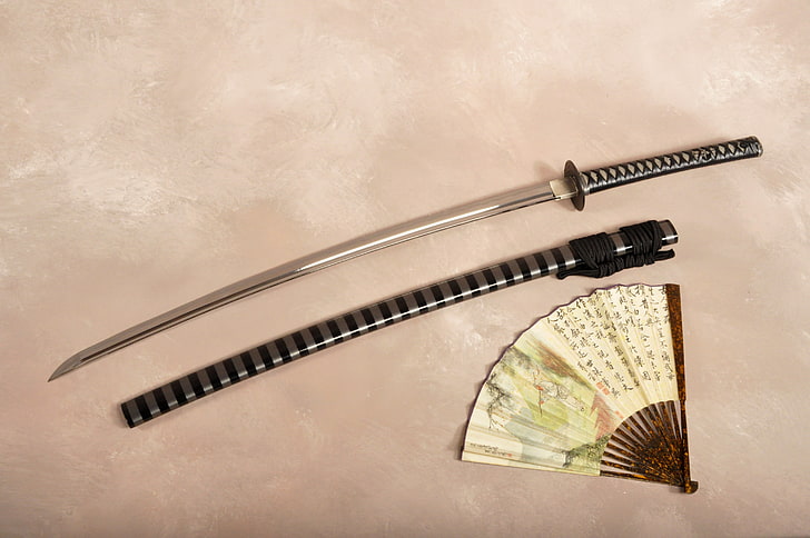 black tsuka katana sword with sheath, fan, currency, paper Currency