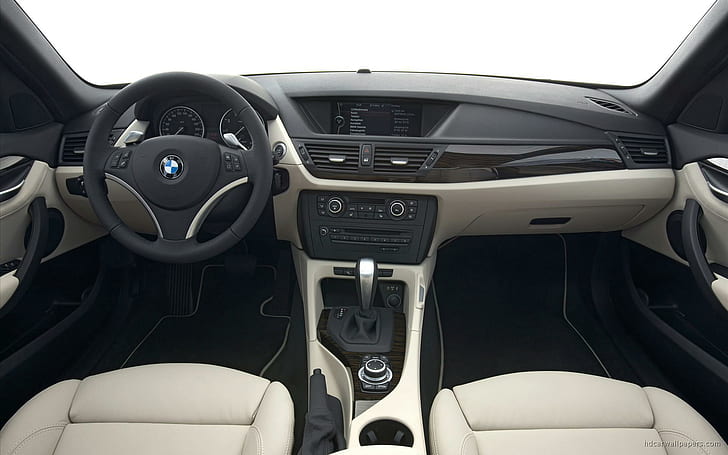 2010 BMW X1 Interior, black bmw multi function steering wheel and dashboard