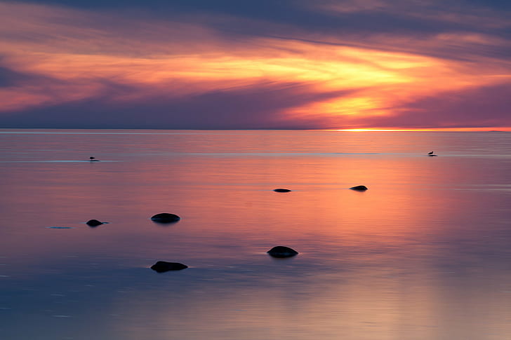 rocks submerged in water during sunset, Burning, long exposure