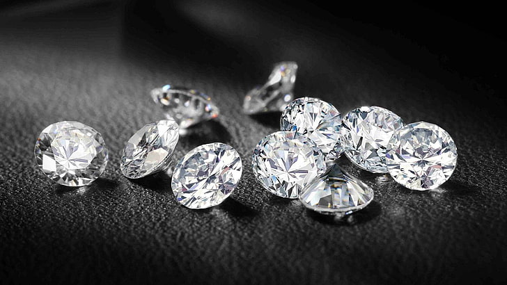 Chỉ cần một cái nhìn vào hình nền kim cương này, bạn sẽ ngay lập tức cảm nhận được sự thịnh vượng và sang trọng. Hãy chiêm ngưỡng quyền lực của nền kim cương. 