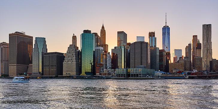 assorted-color concrete buildings, new york, skyscrapers, beach