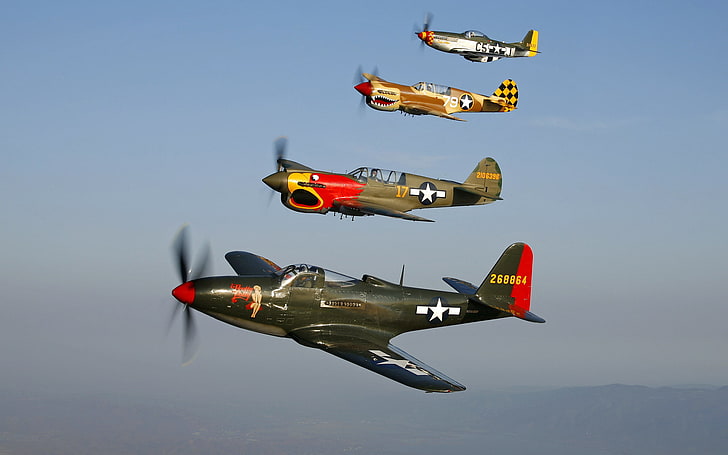 four aircraft, Bell P-63A Kingcobra “Pretty Polly”, Warhawk Curtiss P-40N Warhawk “Parrothead”