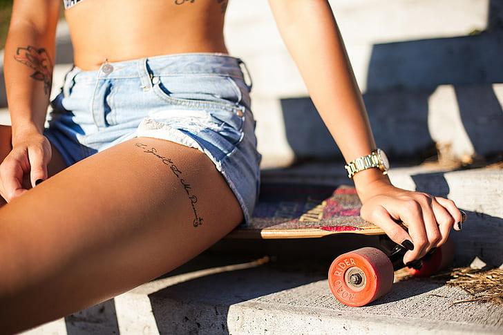 women, jean shorts, tattoo, black nails, skateboard, belly