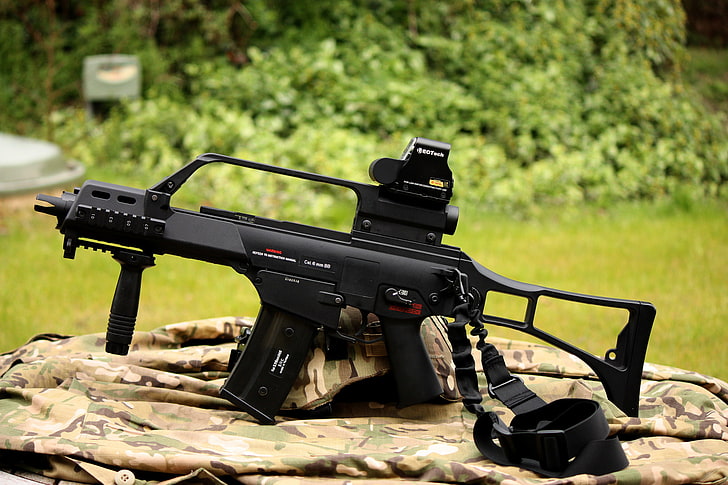 black airsoft rifle, weapons, machine, assault, HK G36C, focus on foreground