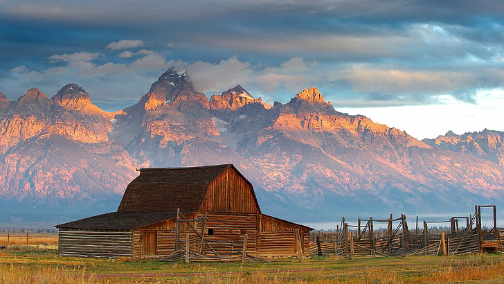 landscape photo of wooden house behind the mountains, Jackson Hole