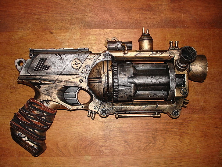 gray and brass revolver toy, gun, material style, artwork, orange