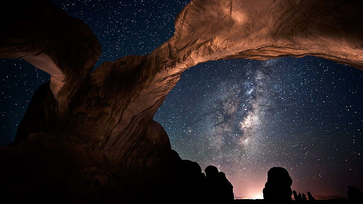 Milky Way above Double Arch, arch canyon under sky with stars illustration
