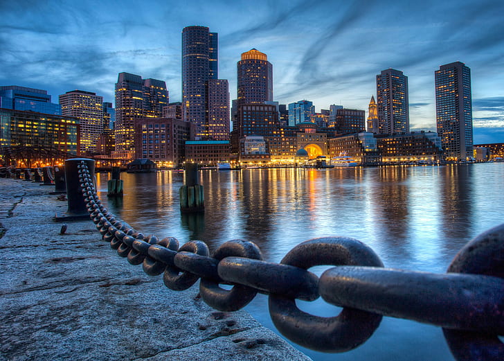photo of black metal chain on bridge near high rise buildings and calm body of water at daytime, boston, boston