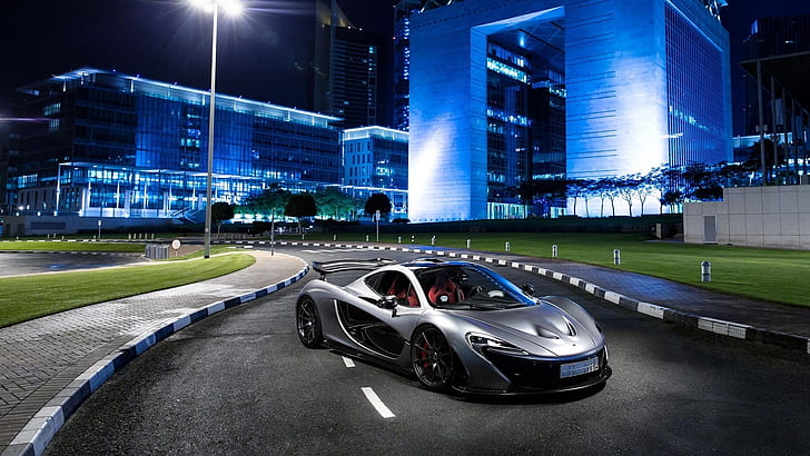 McLaren P1 silver supercar at city night