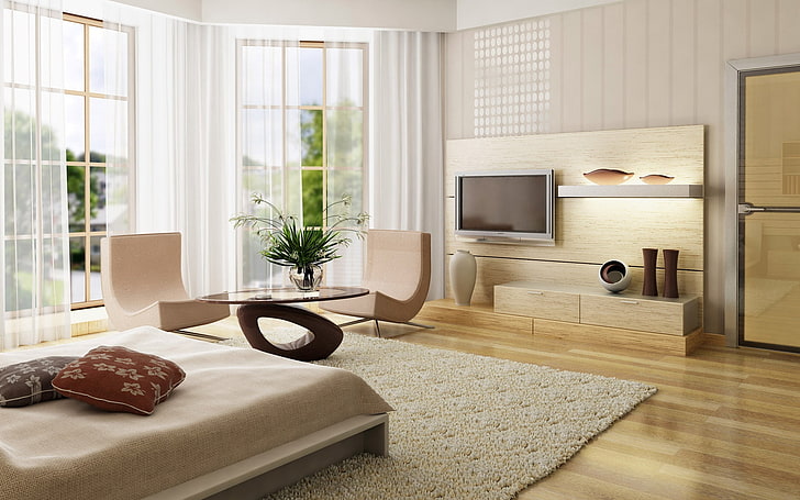 gray flat screen TV; brown entertainment system; two beige chairs; and brown bed