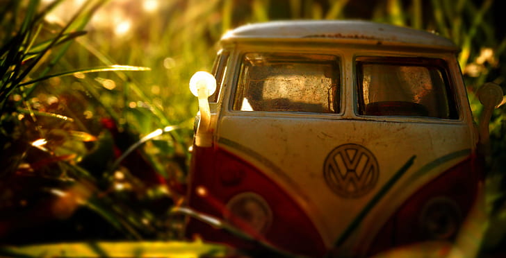 white and red Volkswagen van diecast on grass, good old days