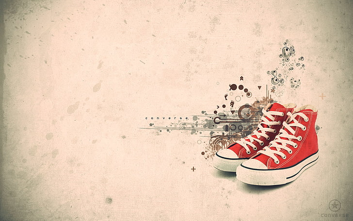 Premium Photo | A pair of red sneakers with a pink background and a splash  of watercolors.