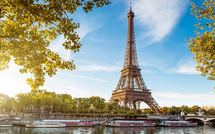 Eiffel Tower, Paris, France, the river Seine, boats, blue sky