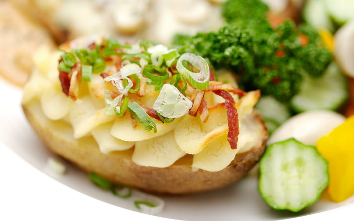 Stuffed potato, potato sliced with broccoli and onion springs