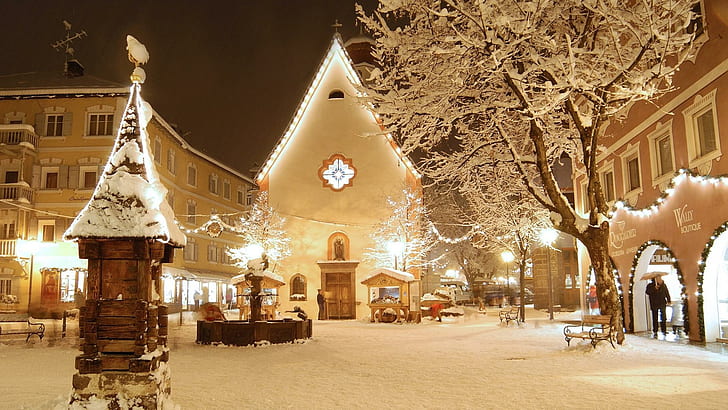 Val Gardena Italy Town Square In Winter, town covers in snow photo