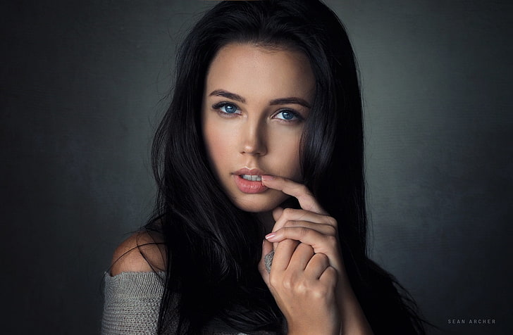 women, portrait, simple background, finger on lips, blue eyes
