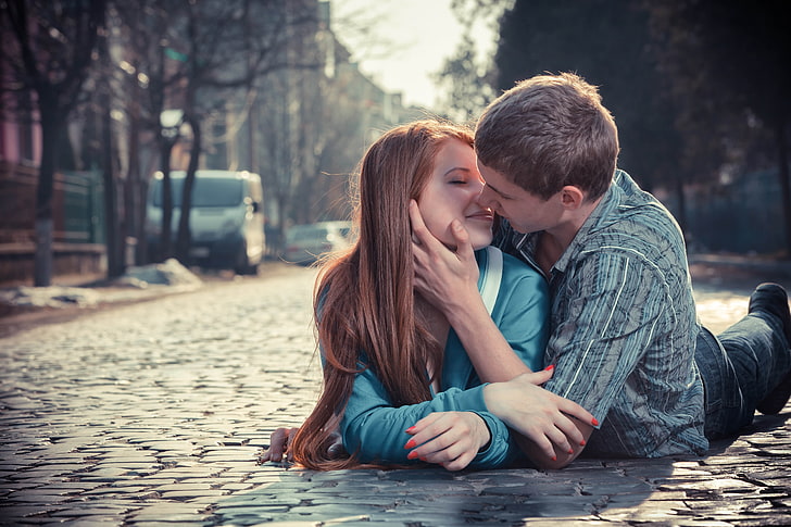 men's blue collared top, boy, girl, kissing, love, road, city