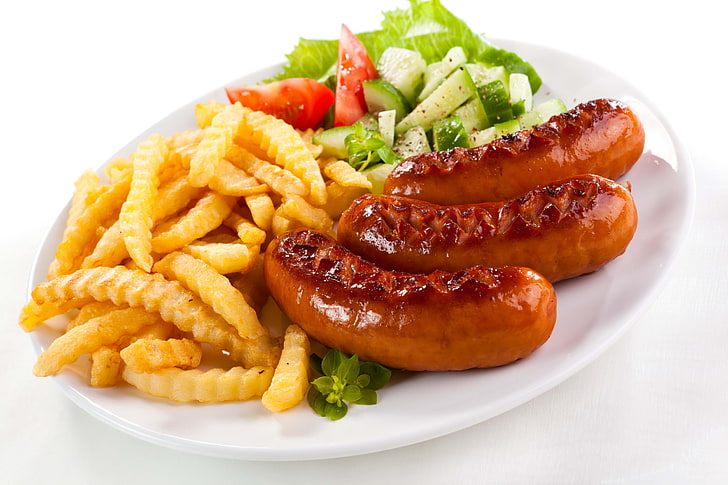 sausage with french fries and vegetable, potatoes, salad, plate