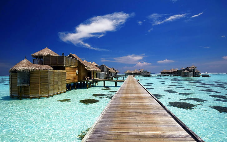 Luxury Resort in Maldives, brown wooden dock, sea, landscape