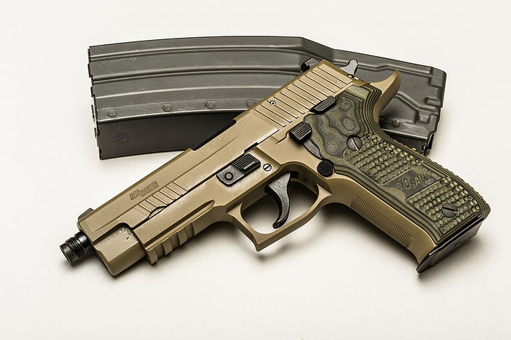 beige semi-automatic pistol and black plastic rifle magazine case