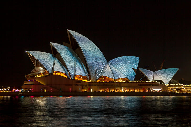 lit Sydney Opera House in Australia at night, sydney opera house