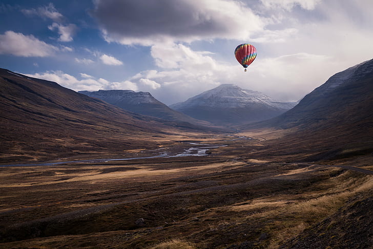 hot air balloon flying over mountains during daytime, color, tu