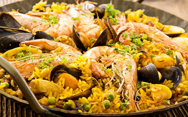 black ceramic bowl, seafood, shrimp, mussels, rice, peas, vegetable