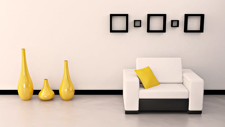 white and gray sofa chair with yellow throw pillow and three yellow vases