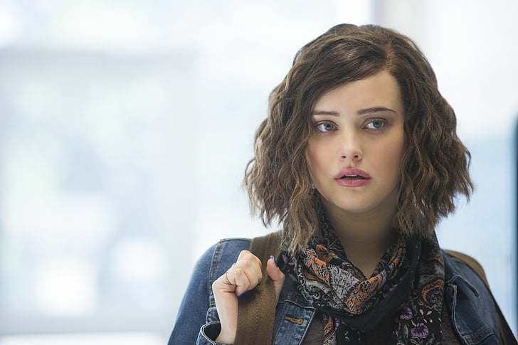 woman in blue denim jacket holding backpack, 13 Reasons Why, Katherine Langford