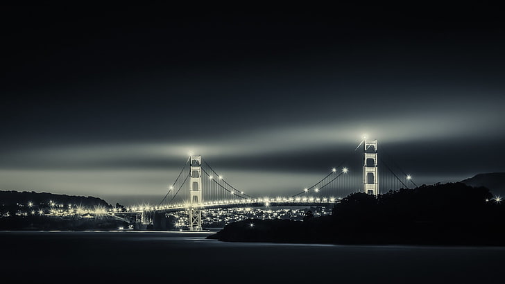 grayscale photograph of lighted Golden Gate Bridge, monochrome