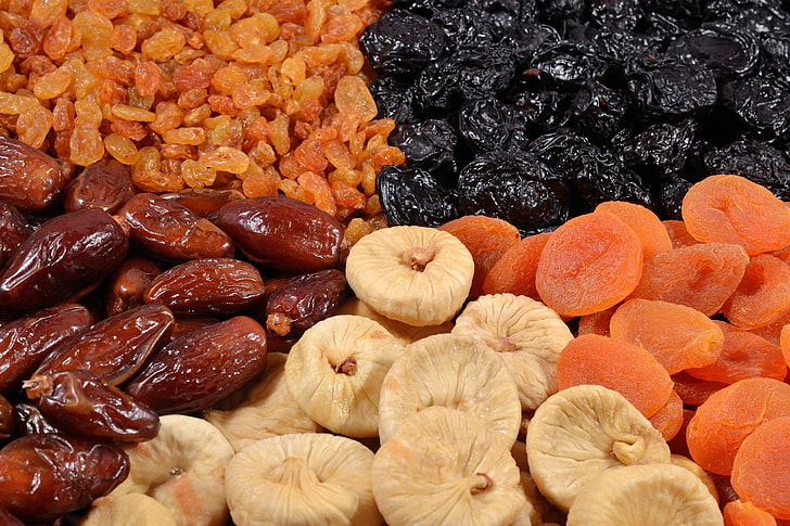 assorted candies, raisins, figs, dried apricots, dried fruits