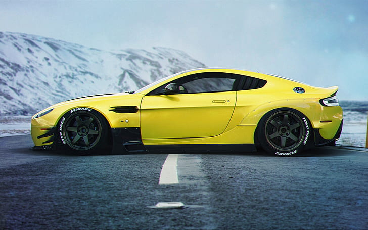 Aston Martin Vanquish yellow supercar side view