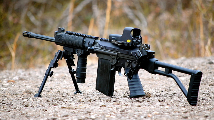 black M4A1 assault rifle with vertical grip and holographic sight