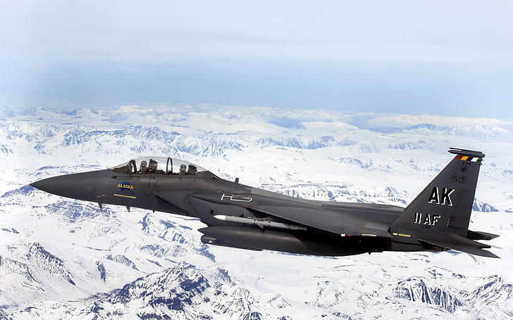 F 15E Strike Eagle flys over Glacial fields, planes