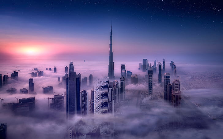 cityscape burj khalifa dubai city sunrise mist skyscraper building long exposure tower clouds sky