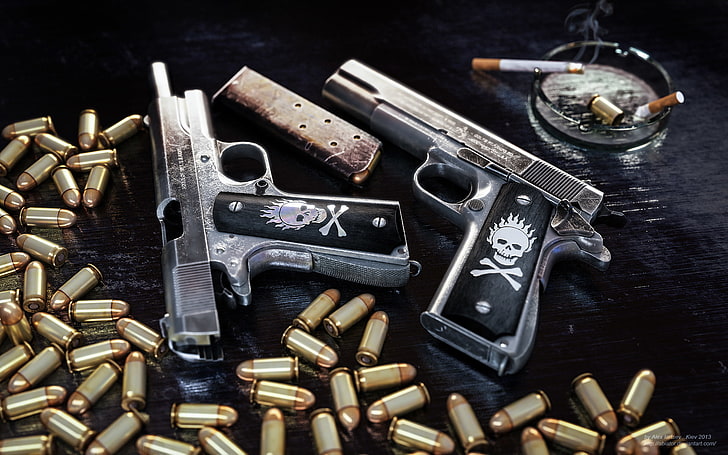 two gray-and-black semiautomatic pistols, guns, cigarette, cartridges
