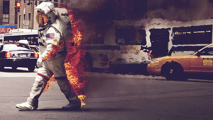 person's white suit, man wearing astronaut suit burning, fire