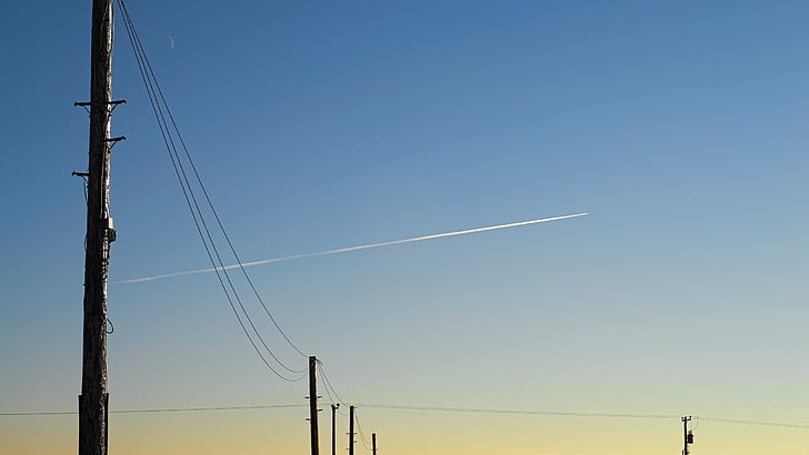 black electric post, sky, airplane, contrails, electricity, cable
