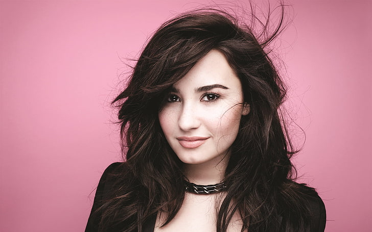 Demi Lovato, looking at viewer, long hair, simple background