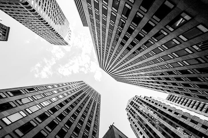 grayscale photo low angle of view of high-rise buildings, I Can
