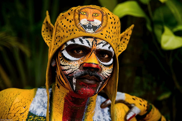 Tiger Man, man tiger body paint, onam, yellow, dancer, black