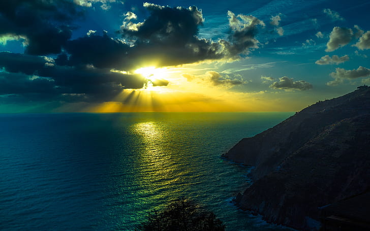 Ocean, sea, sky, clouds, sun rays, mountains, dusk, golden sunrise behind clouds, HD wallpaper
