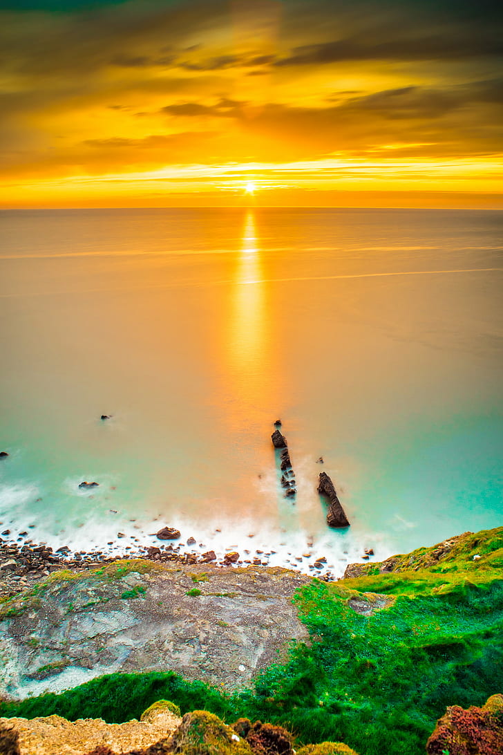 aerial photo of a cliff and sea, Sunset, Bude, Cornwall, United Kingdom, HD wallpaper