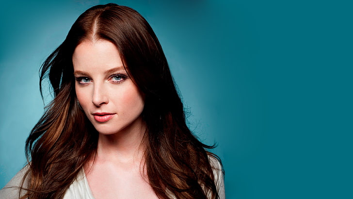 woman's face, brunette, actress, Continuum, blue background, blue eyes