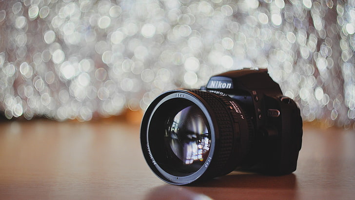 black Nikon DSLR camera, lens, bokeh, wooden surface, camera - Photographic Equipment