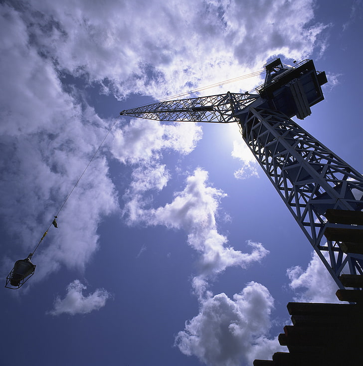 construction vehicles, cranes (machine), sky, clouds, sun rays